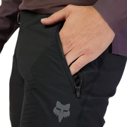 Fox Men's Flexair Pant, black, left pocket view with hand in pocket.