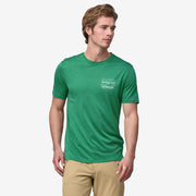 Patagonia Men's Cap Cool Merino Blend Graphic Shirt, skyline green, front view on model.