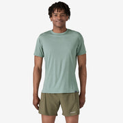 Patagonia Men's Short-Sleeve Capilene Cool Lightweight Shirt, light blue X-dye, front view on model.