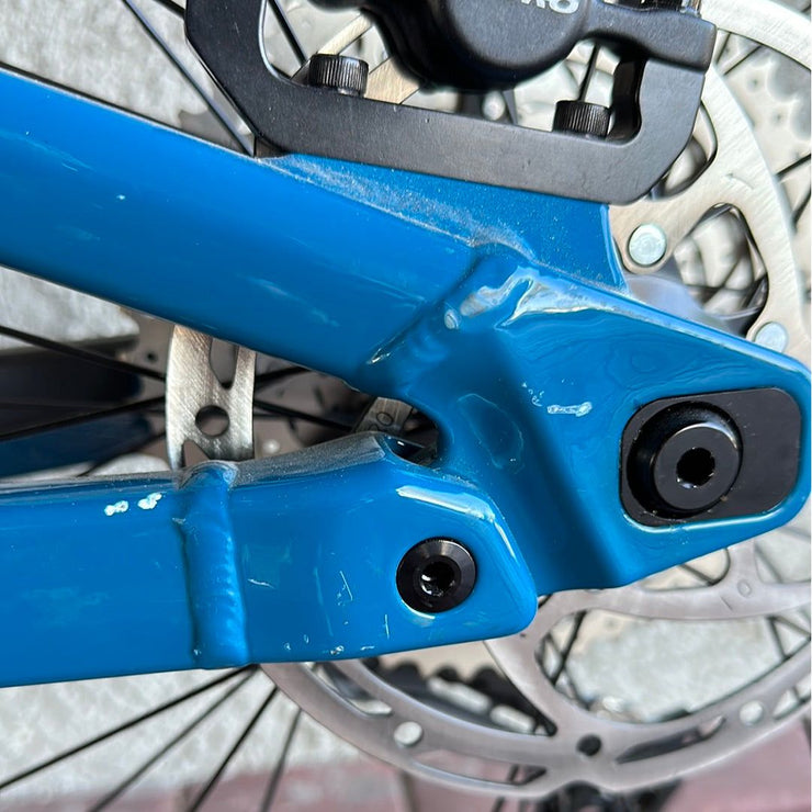 2022 Rocky Mountain Instinct A10, blue/green, *BLEM*, rear triangle close-up view.