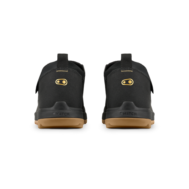 Crankbrothers Stamp Trail BOA Flat Shoes in black/ gold/ gum, back view of pair.