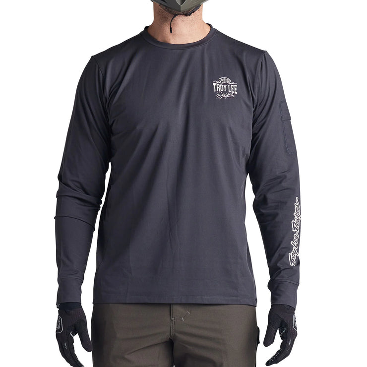 Troy Lee Designs Ruckus Long Sleeve Ride Tee, bolts carbon, front view.