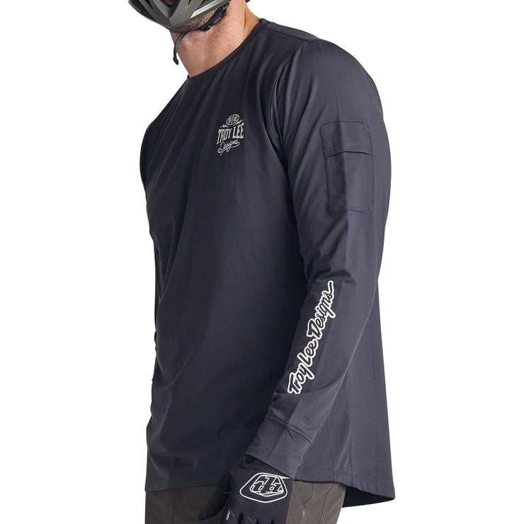Troy Lee Designs Ruckus Long Sleeve Ride Tee, bolts carbon, side view.