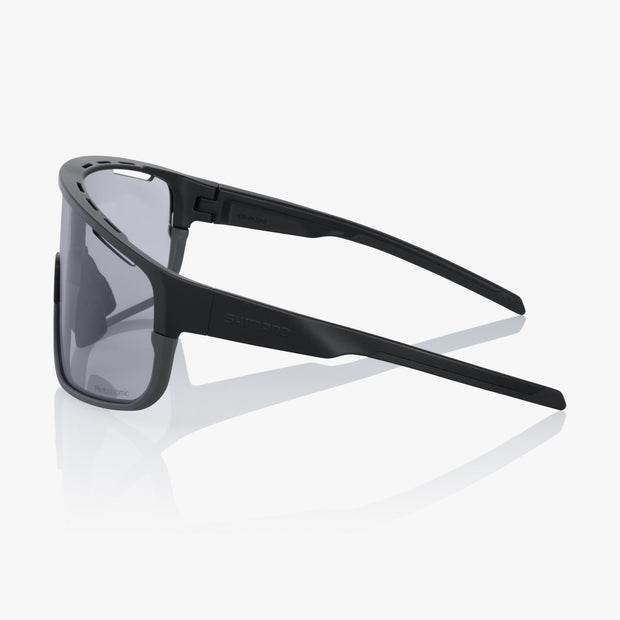 Shimano Pulsar Photochromic, Matte Black Frame With Photochromic Gray Lens, side view.