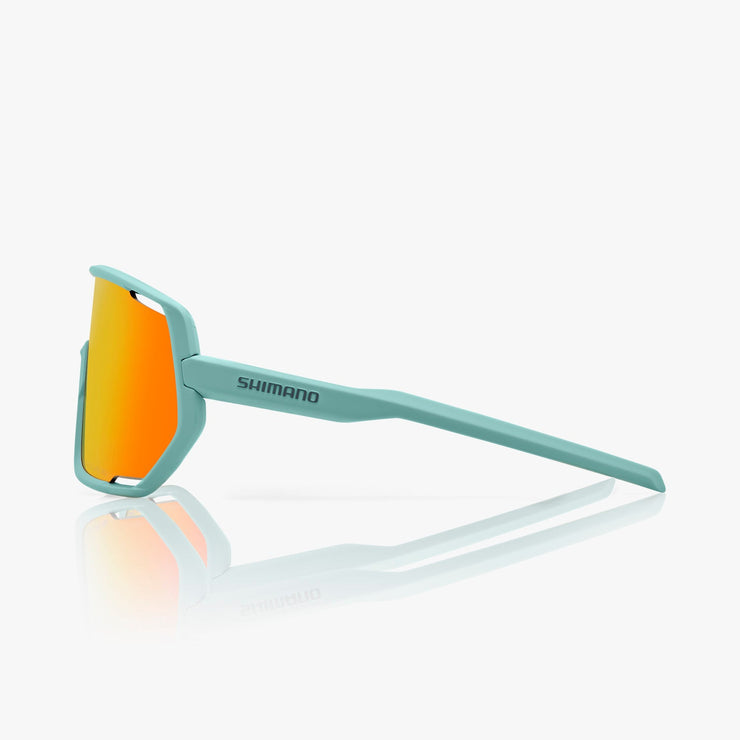 Shimano Technium 2 Sunglasses — Teal Frame / RIDESCAPE Road Lens, side view.